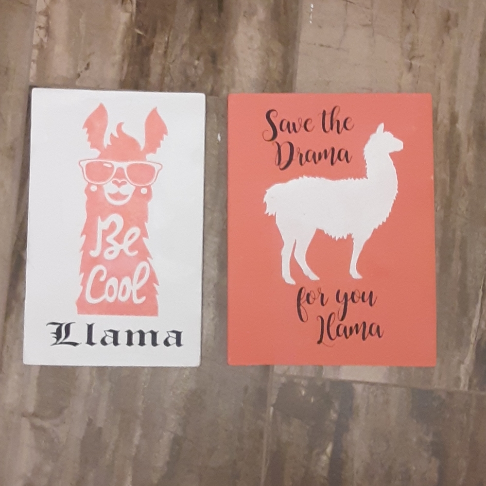 2 wood painted llama signs